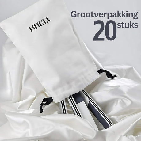 White drawstring bags with black text on a white background